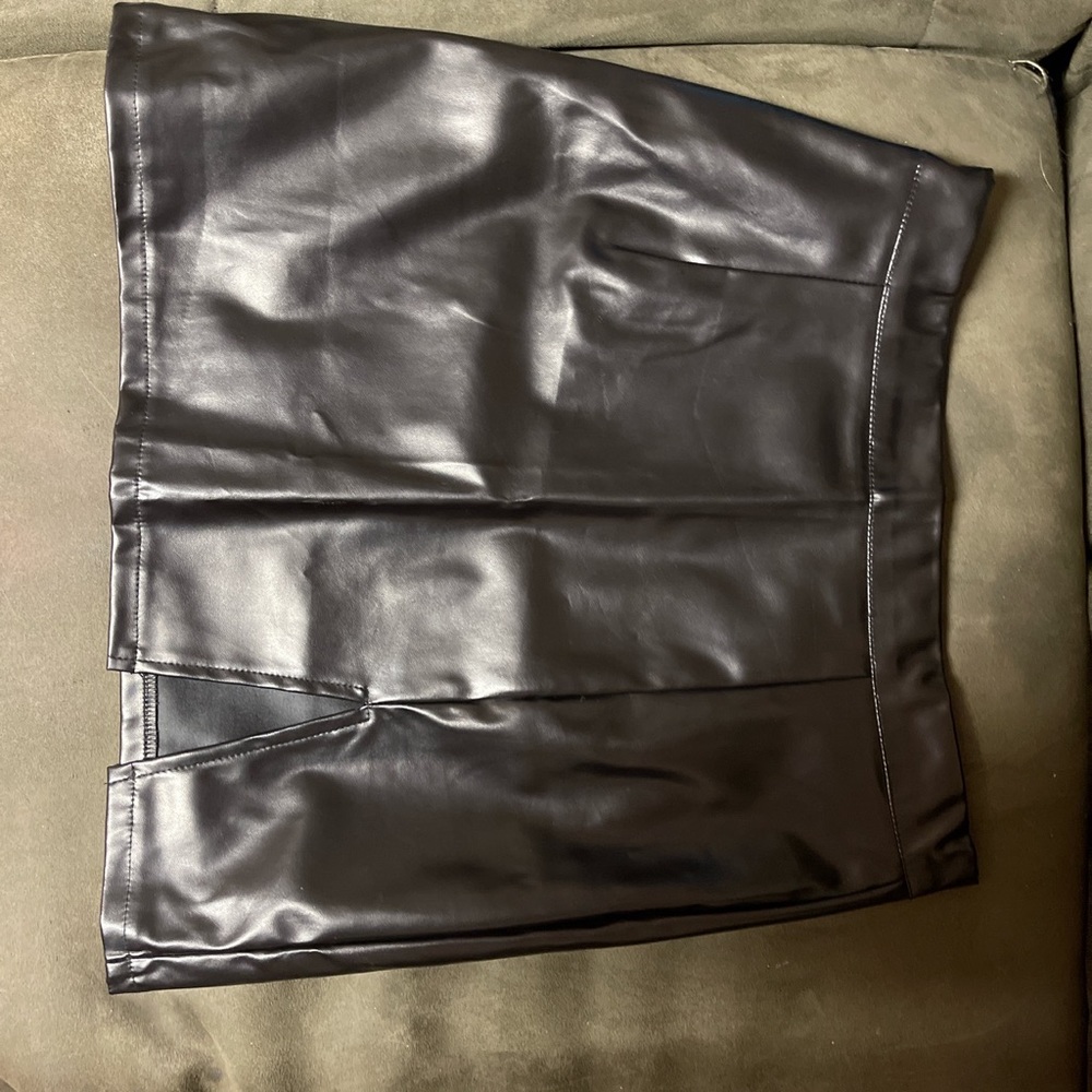 leather . wore once. cut thigh